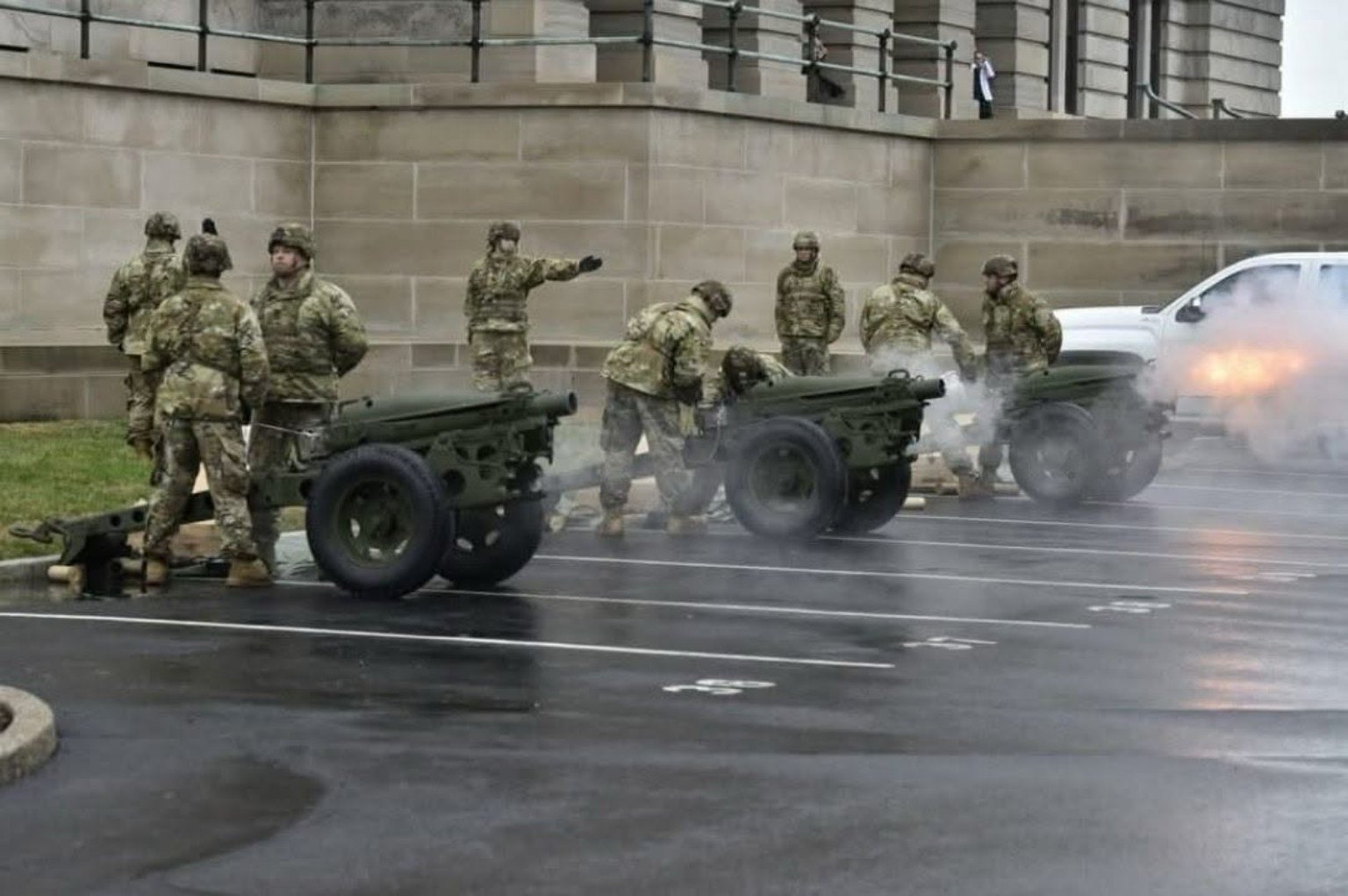 Military service photo with soldiers and artillery
